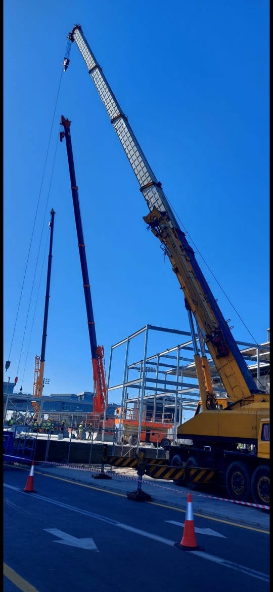 King Abdullah Financial Center crane rental, heavy equipment rental, crane, man lift, scissor lift, boom truck, telehandler, lifting services, construction equipment hire, crane company in Saudi Arabia